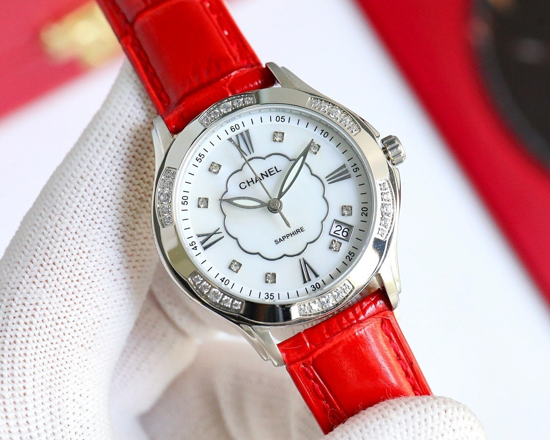 Chanel wristwatch with red leather strap, silver case, white dial, diamond accents, date