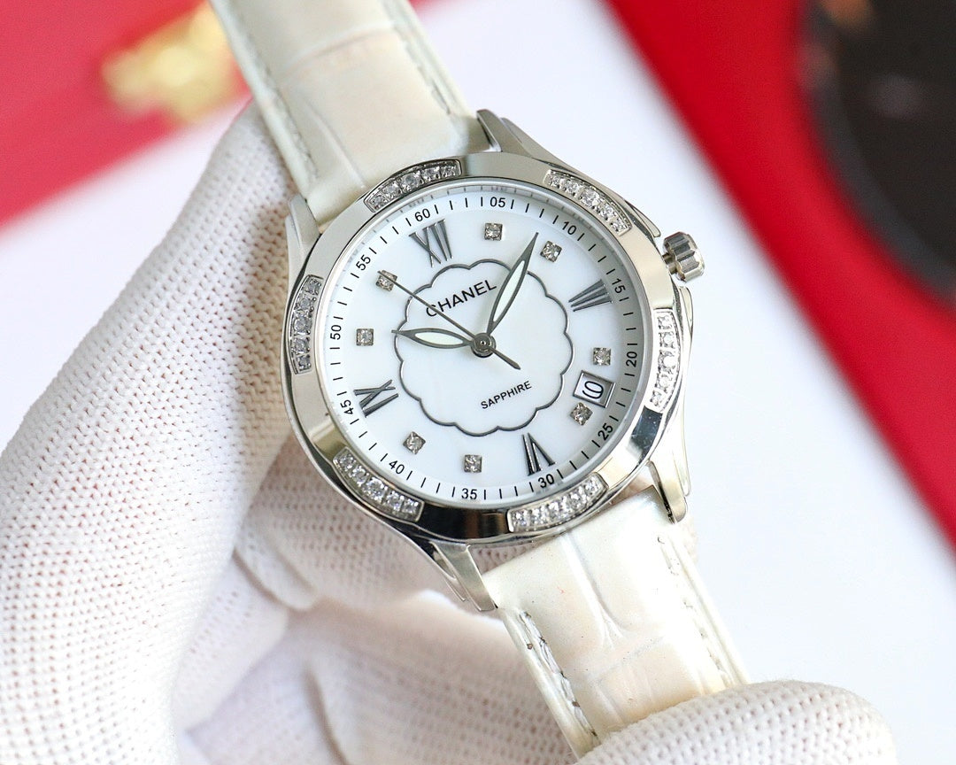 Chanel wristwatch with white leather strap, silver case, white dial, Roman numerals