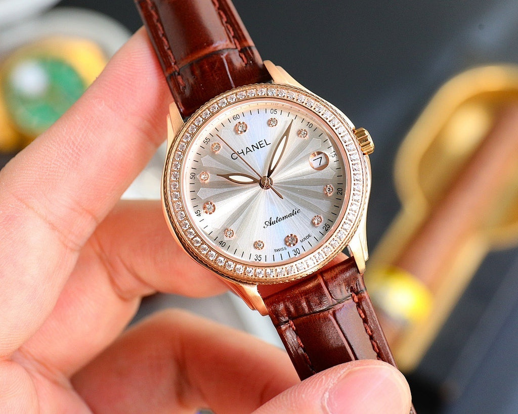 Chanel automatic watch with brown leather strap and rose-gold bezel