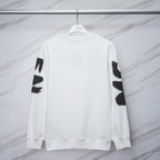 White Alexander McQueen logo sweatshirt, back view with black sleeve lettering