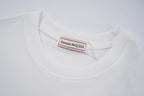 White T-shirt neckline with Alexander McQueen label tag