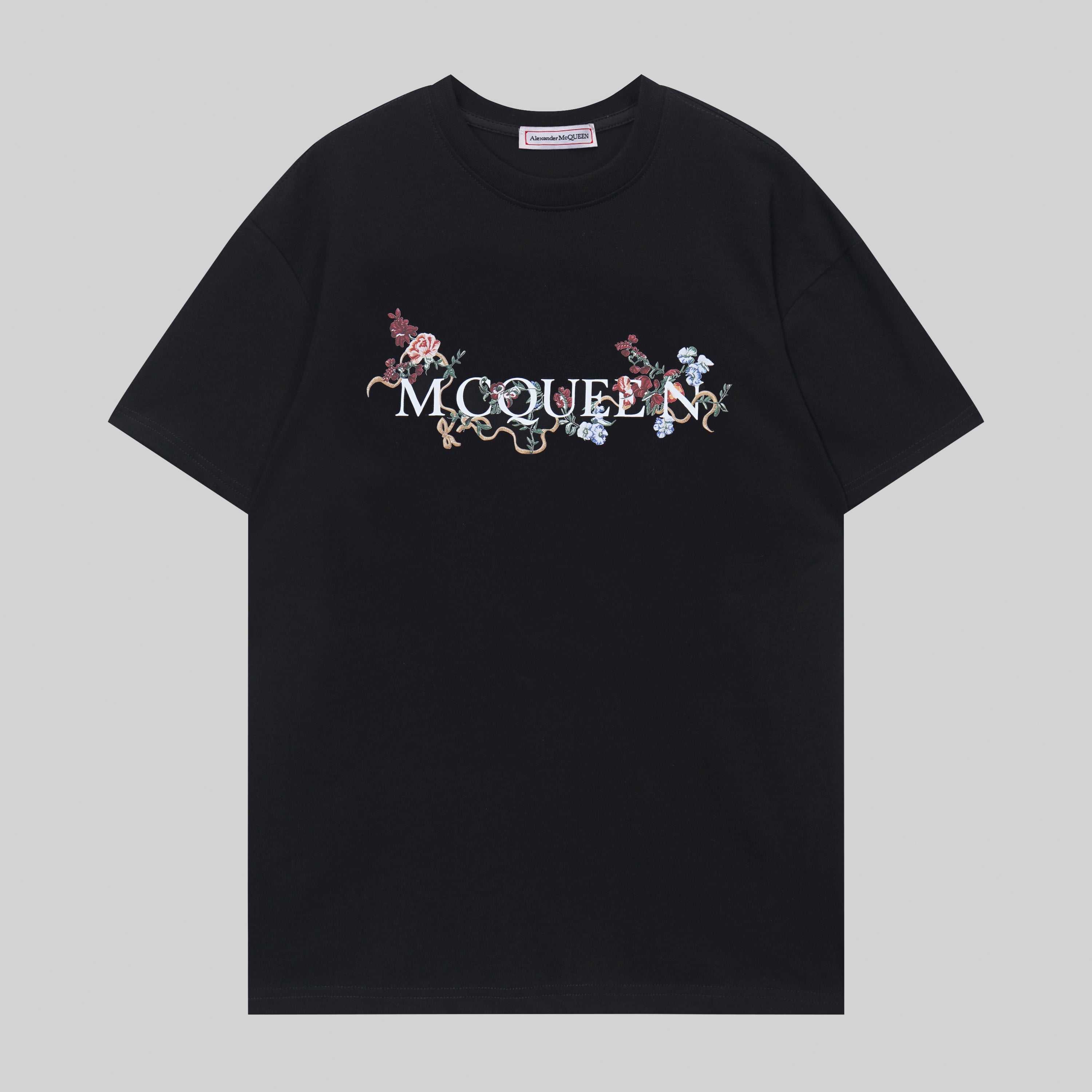 Alexander McQueen black graphic T-shirt with floral lettering print