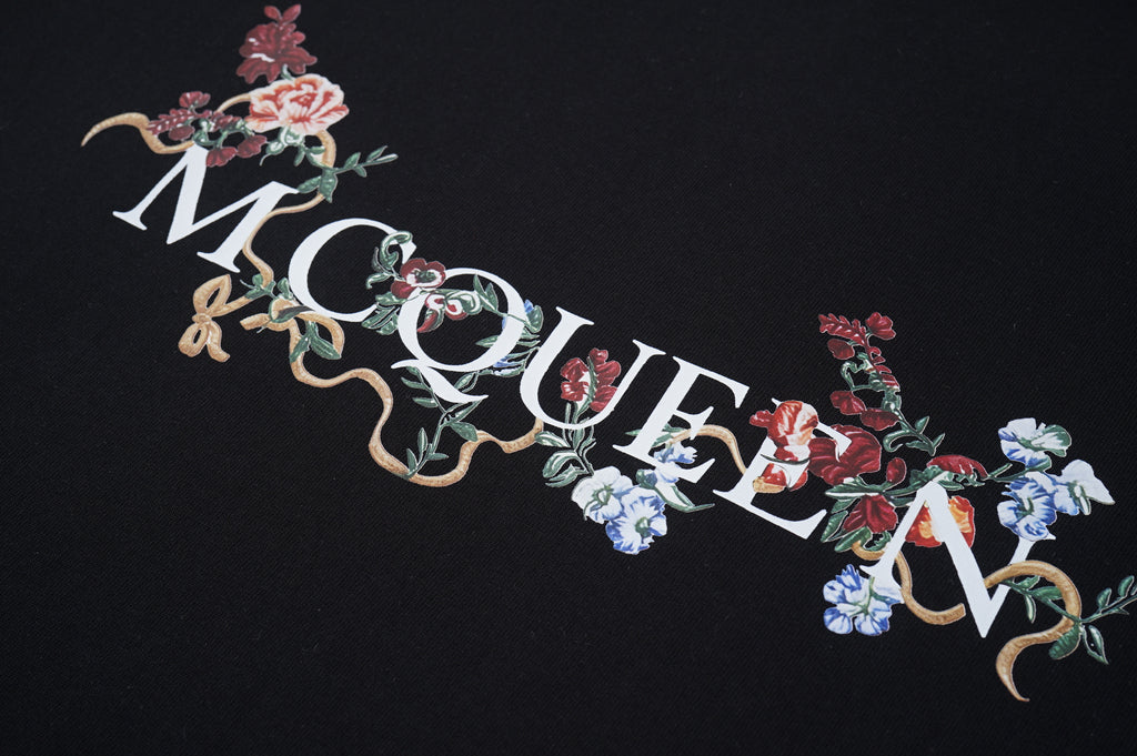 Alexander McQueen floral lettering graphic on black T-shirt