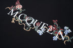 Alexander McQueen floral lettering graphic on black T-shirt