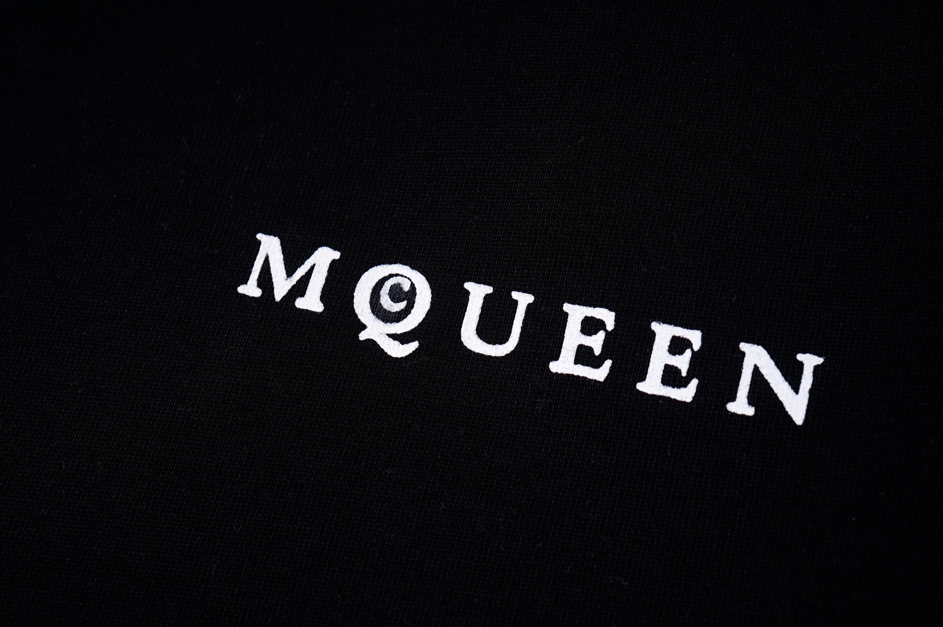 Alexander McQueen black T-shirt with large McQUEEN logo lettering on chest
