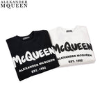 Crewneck sweatshirts, black and white with McQueen front logo and EST.1992