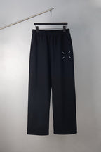 Black wide-leg trousers with embroidered 34/14 logo on front pocket