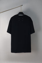Black crew-neck T-shirt with small star-like chest details