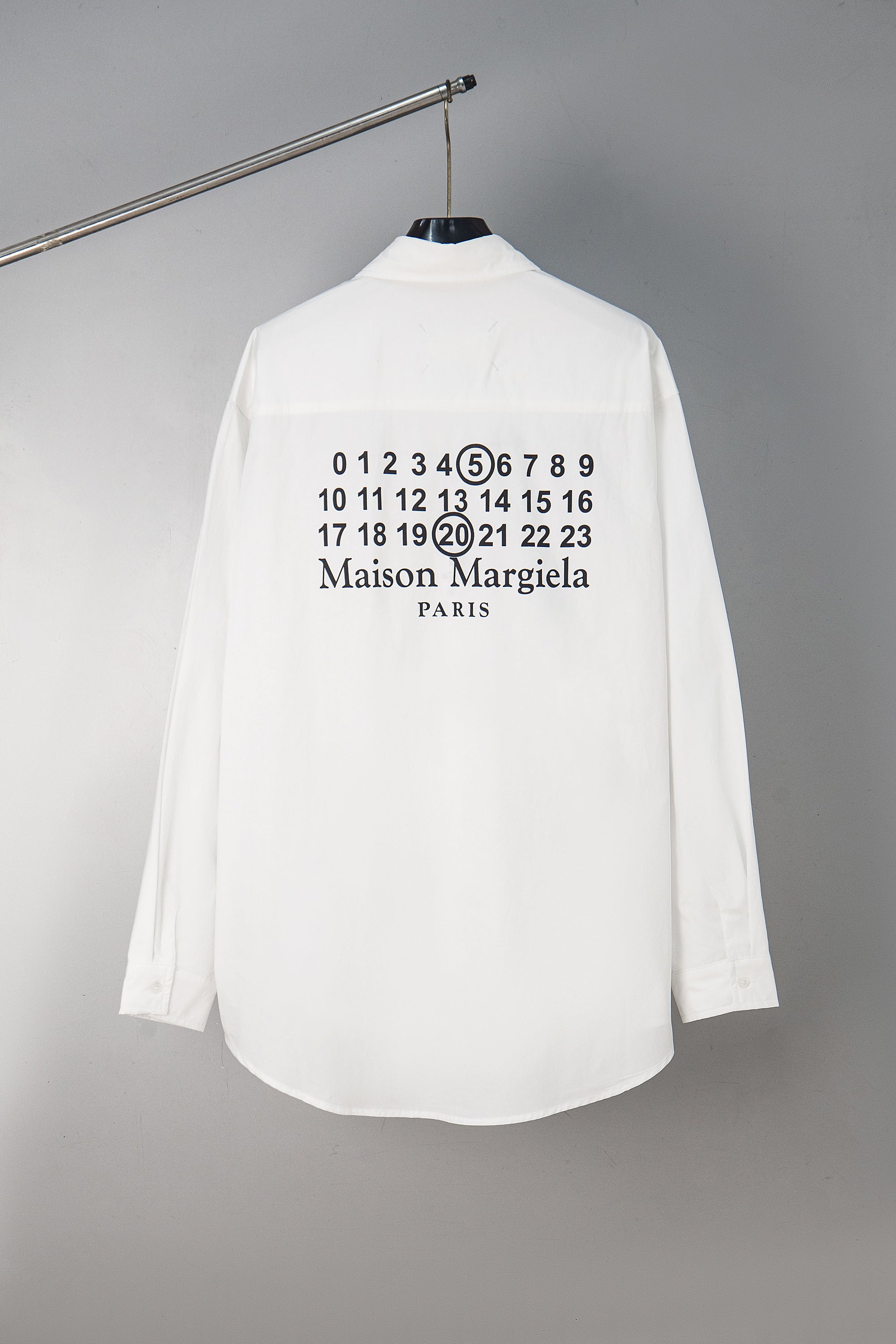 White button-up shirt back with numbers and Maison Margiela Paris print