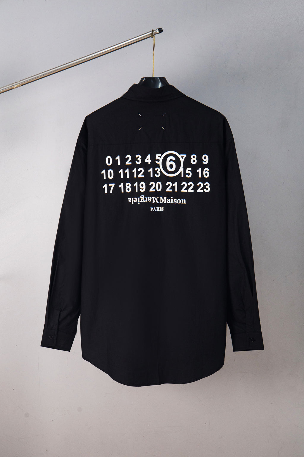Black button-up shirt with large back graphic of numbers and “PARIS”