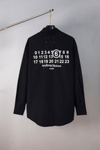 Black button-up shirt with large back graphic of numbers and “PARIS”