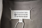 Interior neck size label with numbering and care text