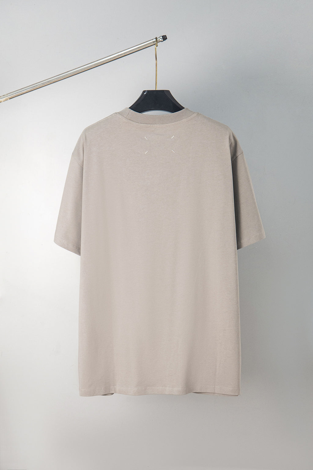 Beige crew-neck T-shirt back view, plain