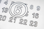 Circular number graphic on T-shirt front