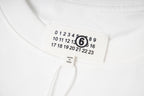 T-shirt neckline label and front number graphic detail