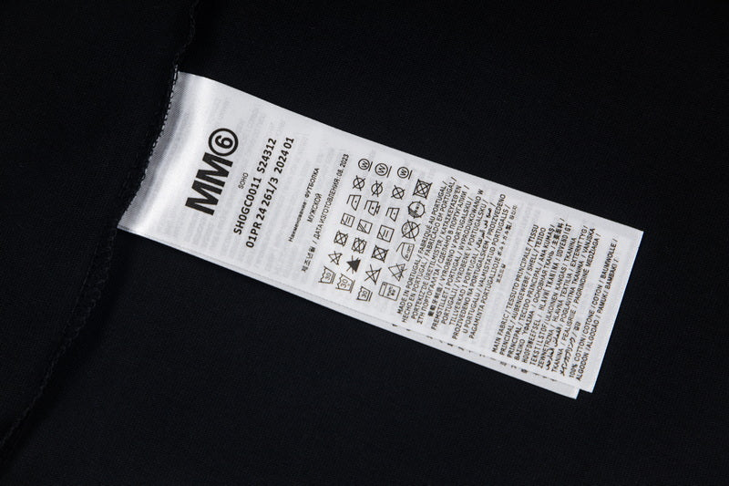 Maison Margiela T-shirt neck label on black fabric