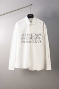 White button-up shirt with black number graphic and circled print at chest