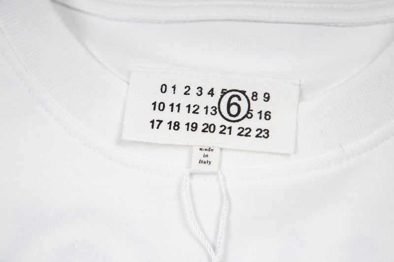White T-shirt neckline with tag and SALOMON number 6 chest graphic