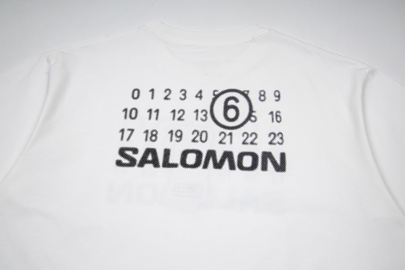 White T-shirt chest graphic with SALOMON text and number 6