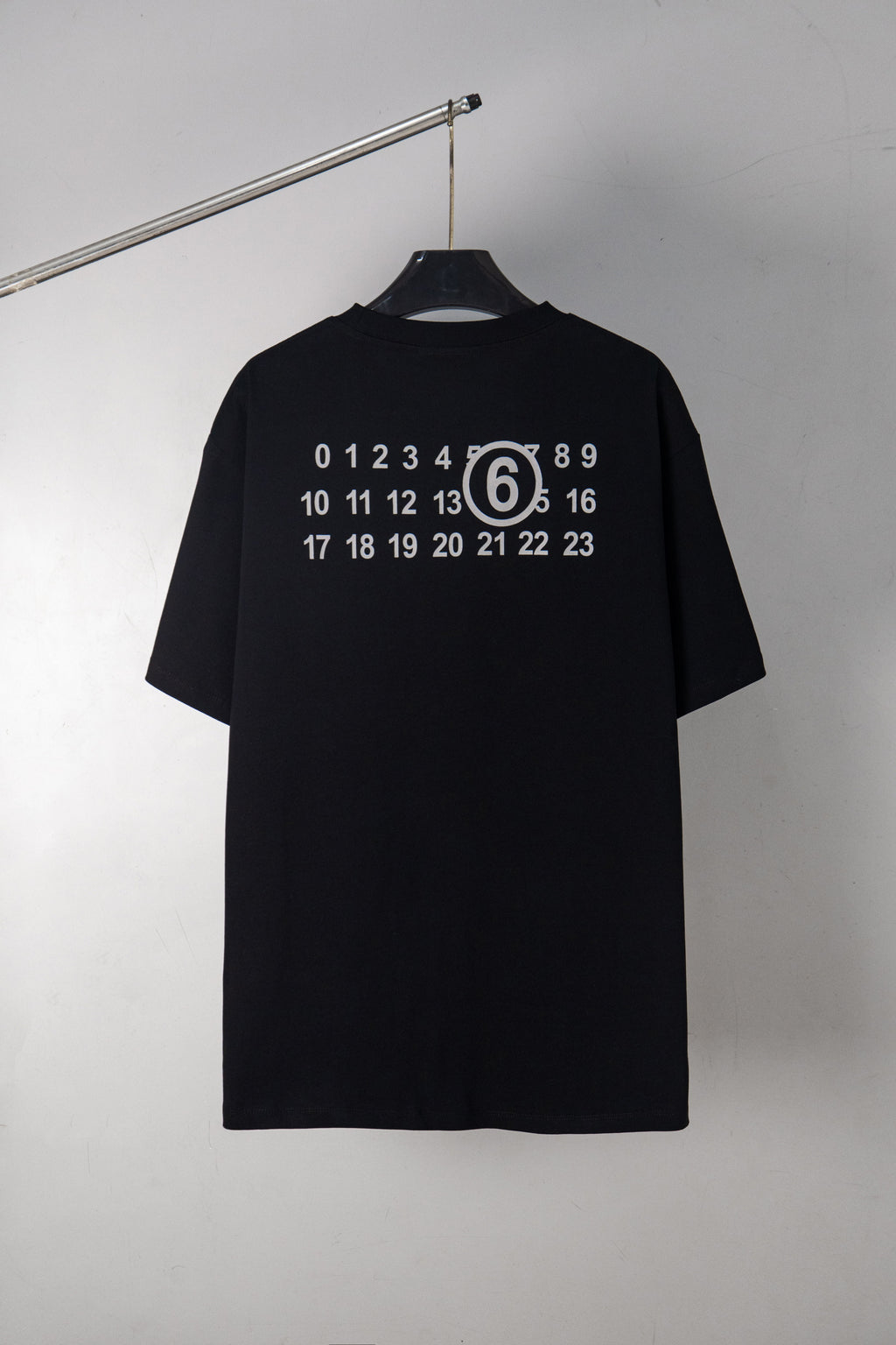Maison Margiela black T-shirt with back number and logo print
