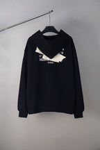 Black long-sleeve zip-up hoodie with graphic Maison Paris logo