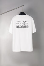 Back of white T-shirt with SALOMON graphic and number 6 print