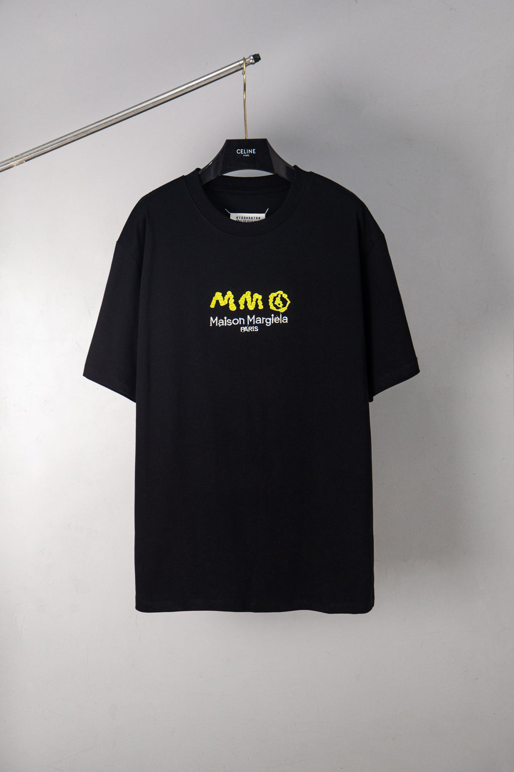 Black crew-neck T-shirt with MM6 Maison Margiela logo graphic print