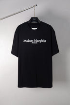 Black short-sleeve T-shirt with Maison Margiela PARIS logo print on front