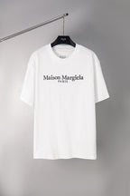 White short-sleeve T-shirt with Maison Margiela PARIS logo print on front