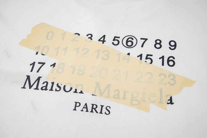 Maison Margiela PARIS graphic print with number line on T-shirt fabric