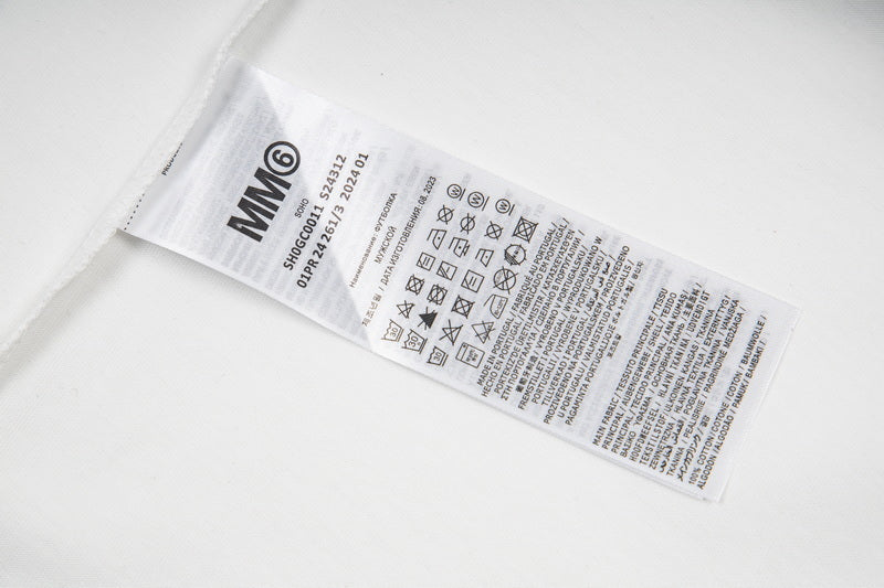 White T-shirt interior care label and size tag