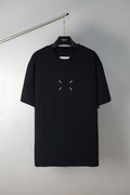 Black crewneck T-shirt with small dash graphic on the chest