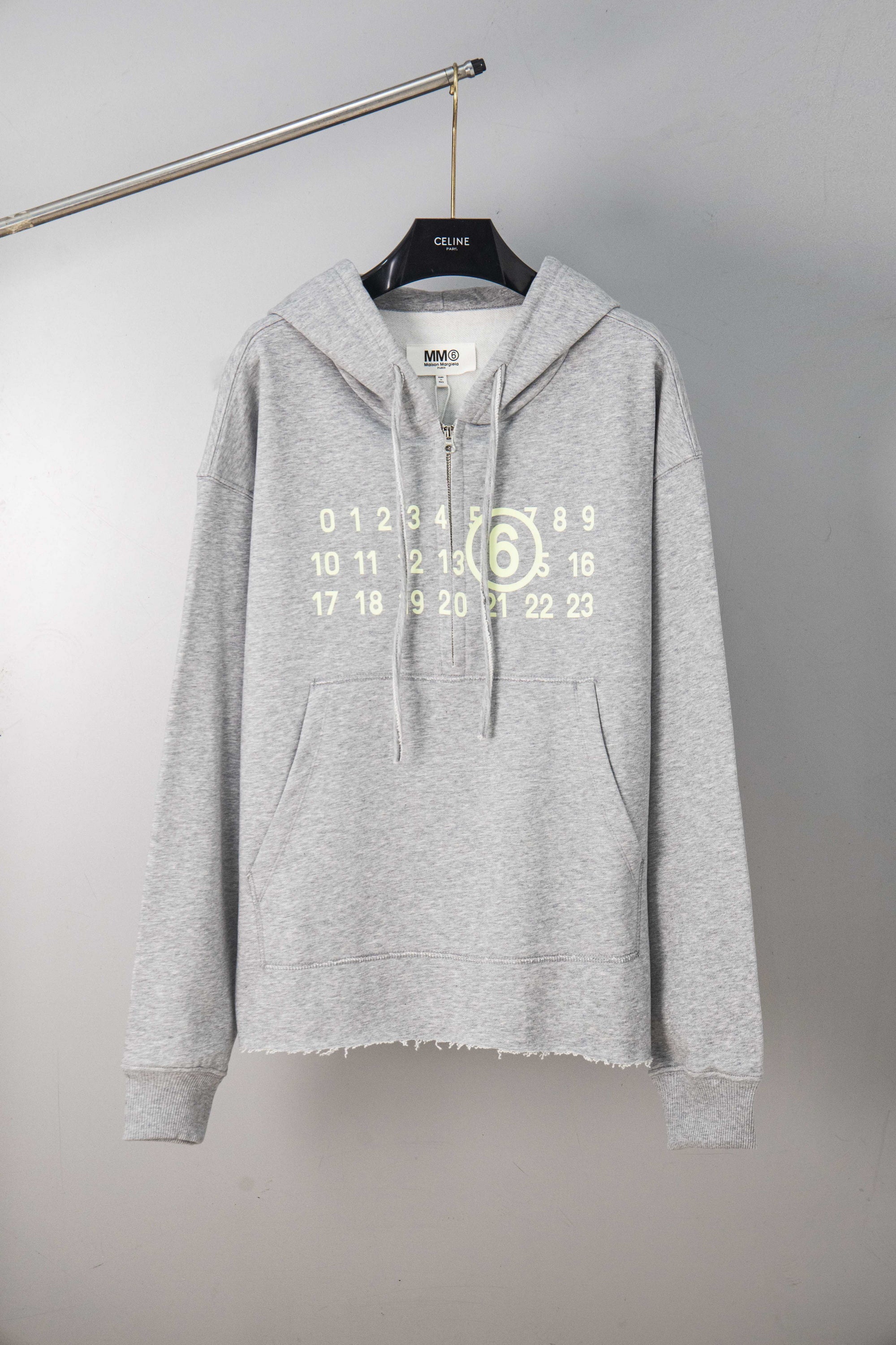 Heather grey MM6 Maison Margiela hooded sweatshirt with half-zip, number graphic, drawstring