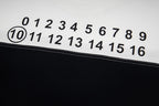 Black T-shirt with numeric logo graphic and circle 10 highlight across chest