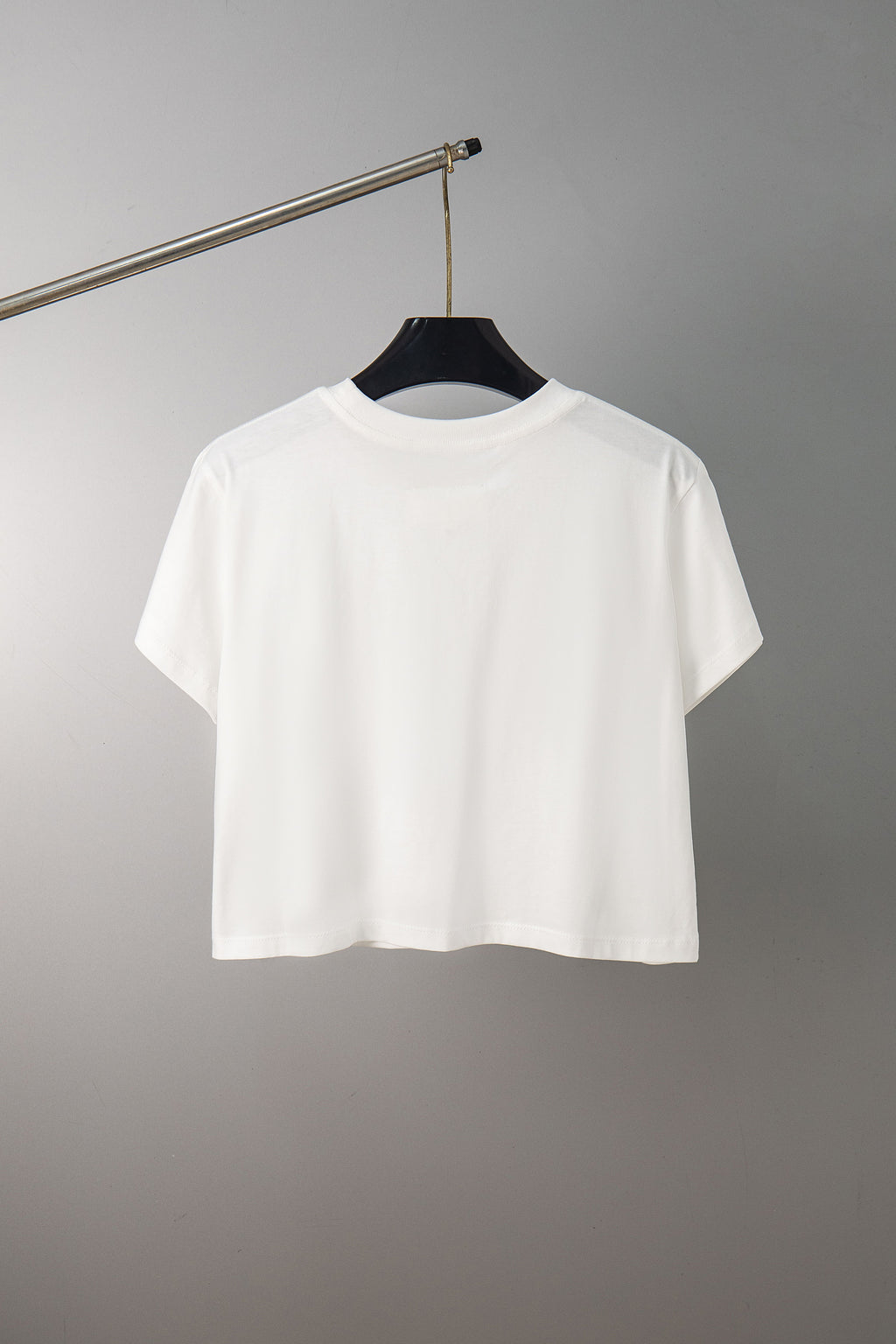 White crewneck T-shirt on hanger, short sleeves