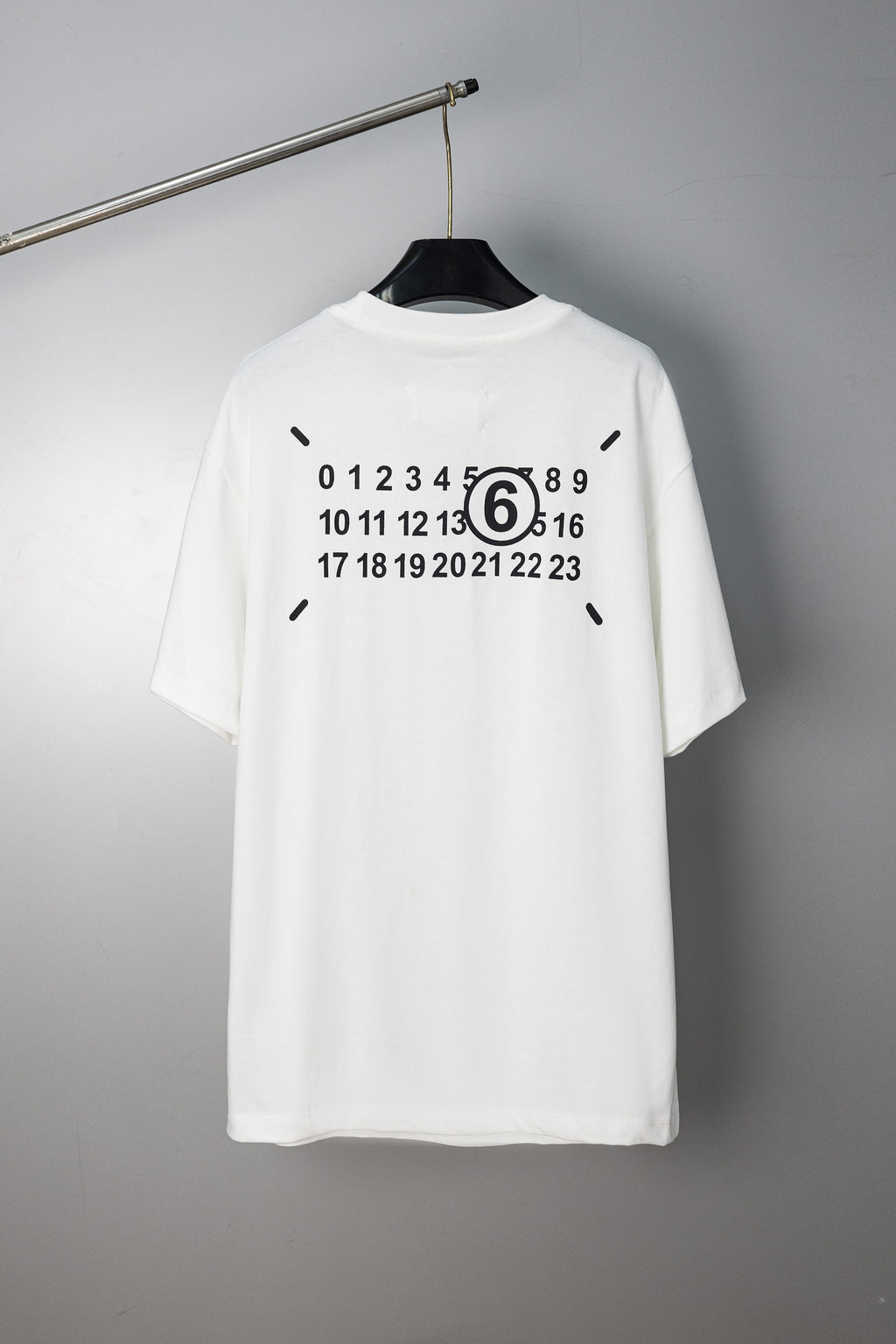White crew-neck T-shirt with large back numeric graphic print and short sleeves