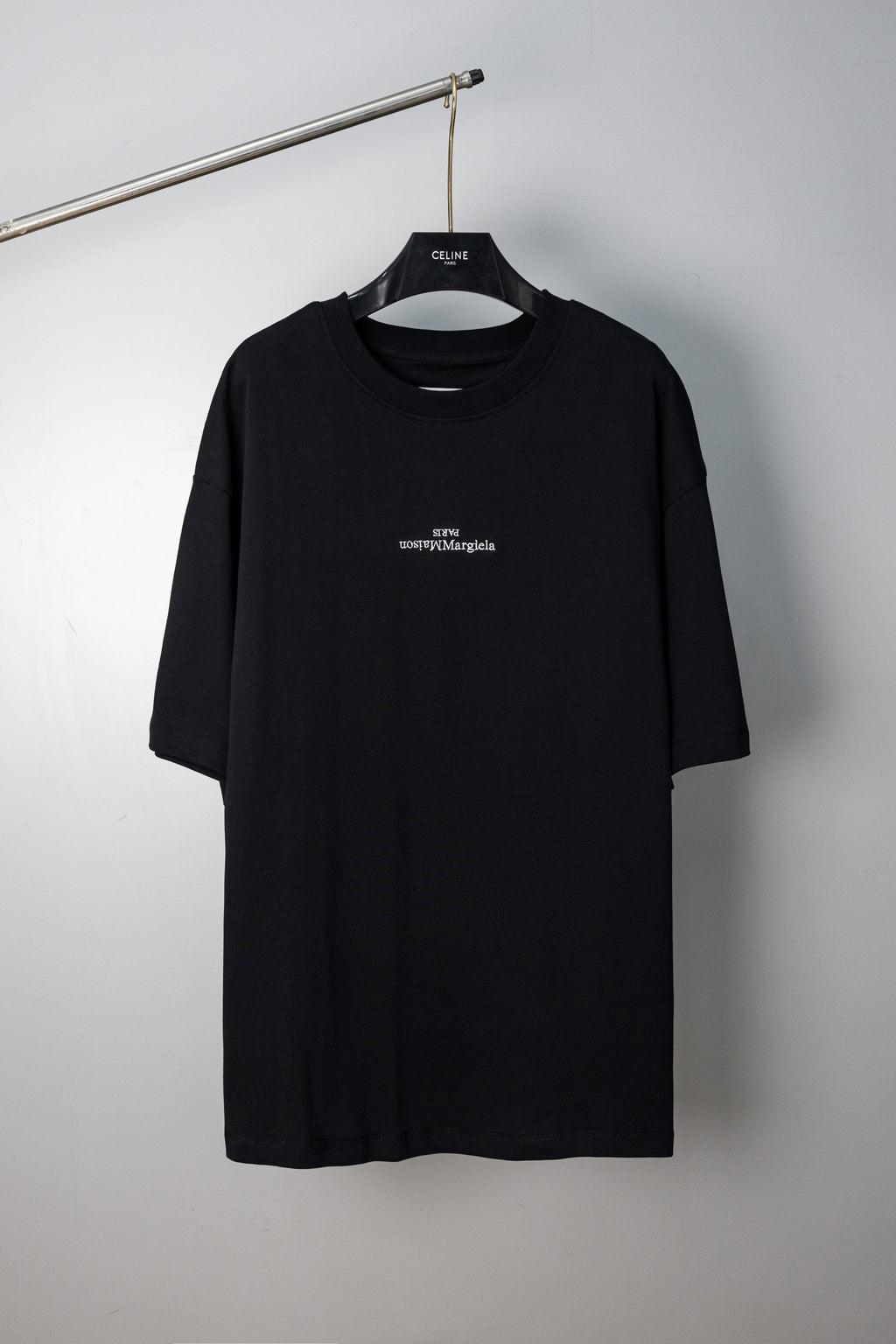 Black Maison Margiela crew-neck T-shirt with small chest logo, short sleeves.