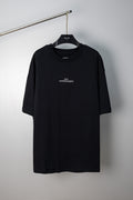 Black Maison Margiela crew-neck T-shirt with small chest logo, short sleeves.
