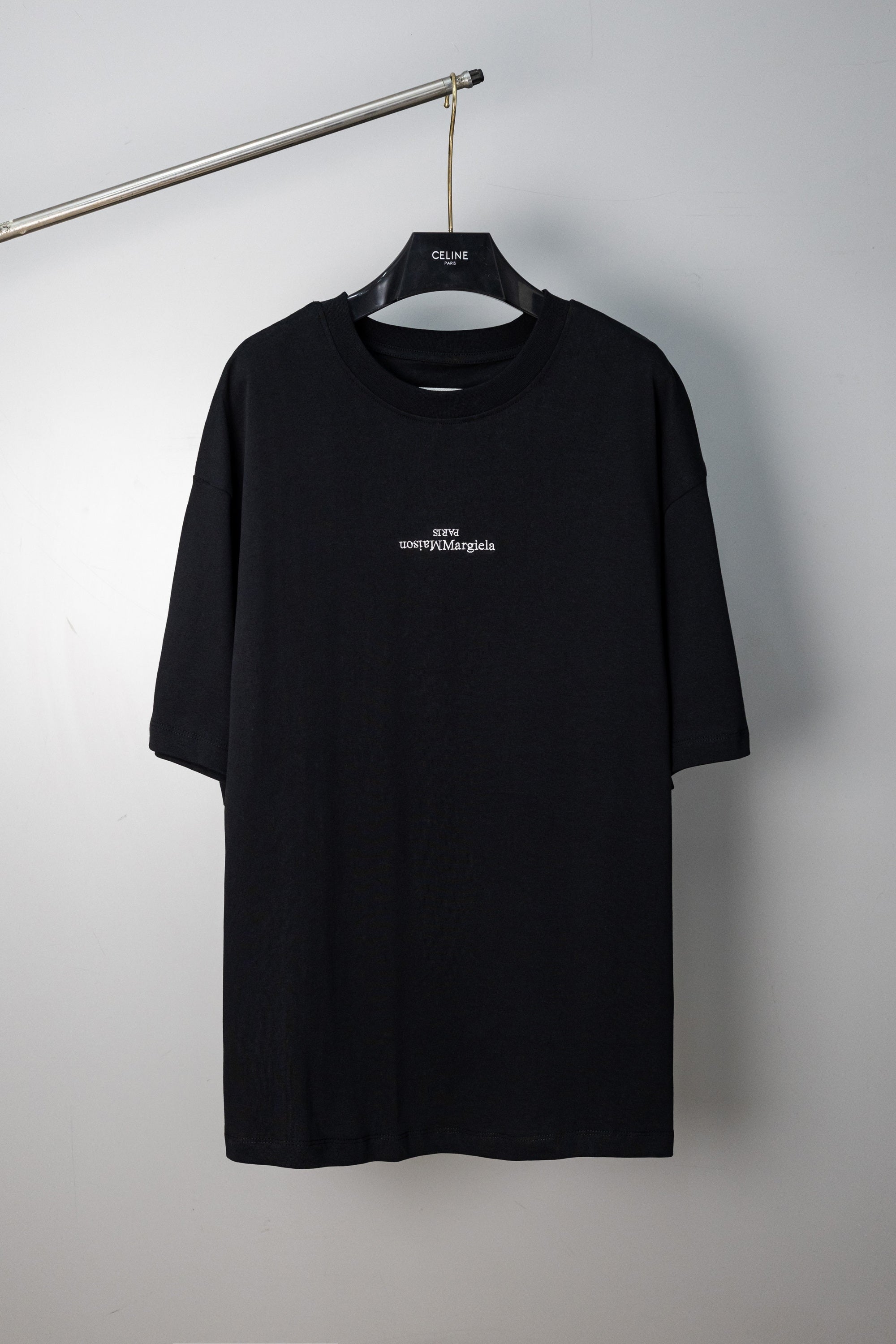 Black Maison Margiela crew-neck T-shirt with small chest logo, short sleeves.