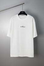 White Maison Margiela crew-neck T-shirt with small chest logo, short sleeves.