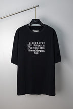 Black graphic T-shirt, crew neck, short sleeves, numbered print