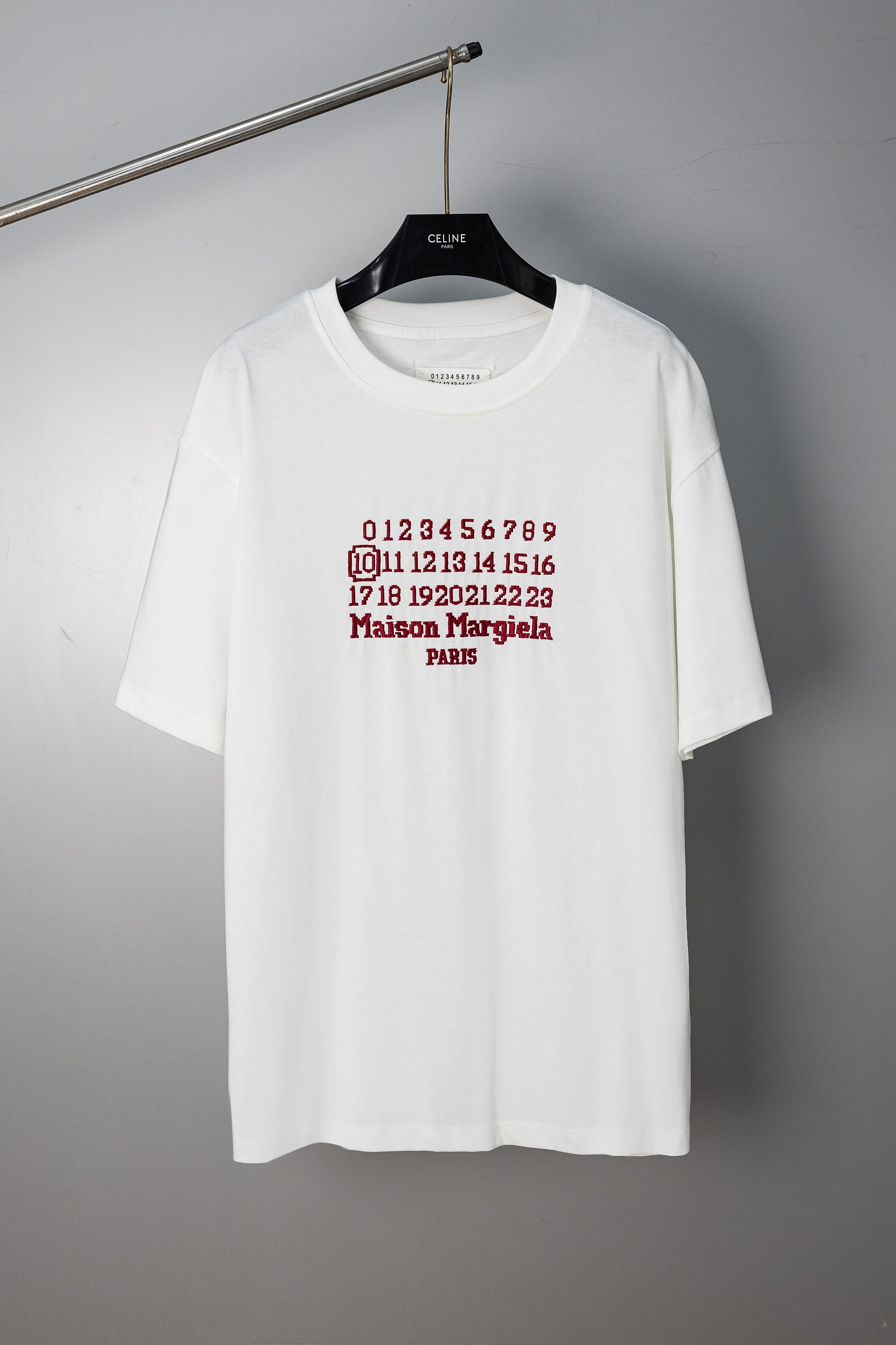 White graphic T-shirt, crew neck, short sleeves, numbered print