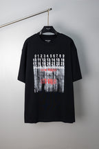 Black crew-neck T-shirt with Maison Margiela graphic print on front