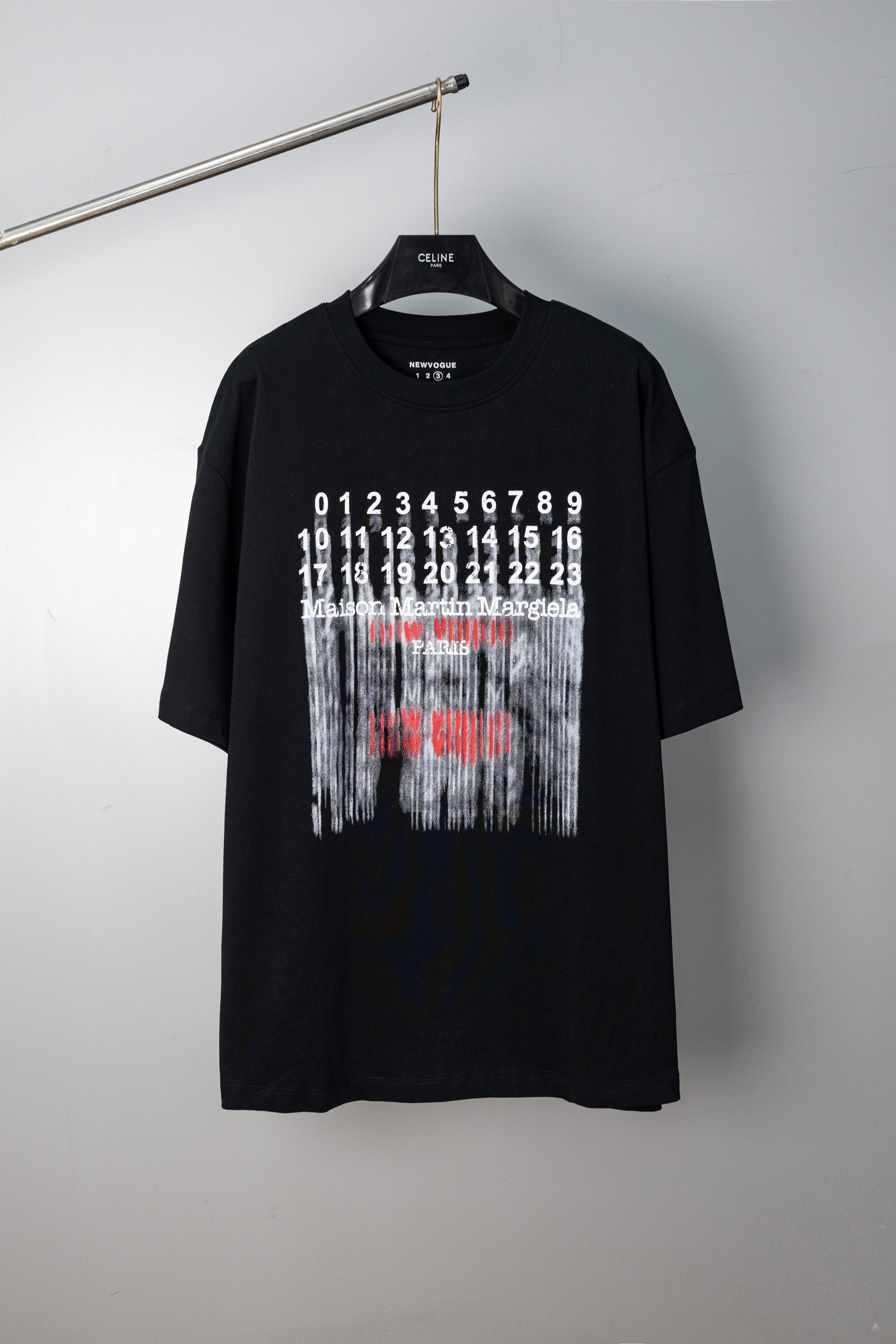 Black crew-neck T-shirt with Maison Margiela graphic print on front