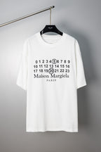White graphic T-shirt with numerals and "Maison Margiela" "PARIS" print on chest