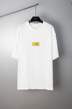 White crewneck T-shirt with multicolor chest label