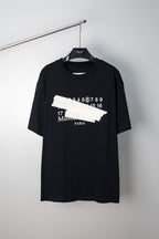 Black crew-neck T-shirt with Maison Margiela number and logo graphic on front