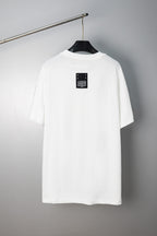 White crew-neck T-shirt with small logo label at the back neckline
