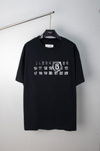 Black crewneck T-shirt with white number graphic on the chest