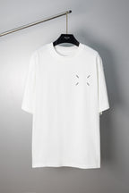 White T-shirt with small chest arrow-like slash accents